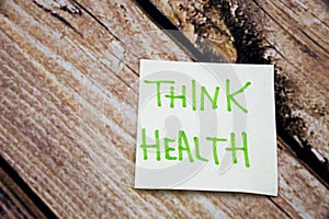 Memo note on Sticky note Think Health, think of your Helath photo