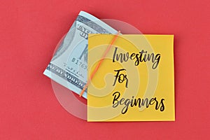 Memo note written with text INVESTING FOR BEGINNERS