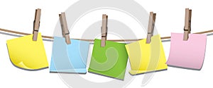 Memo notes hanging on a line