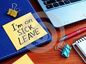 Memo stick with message I am on sick leave photo