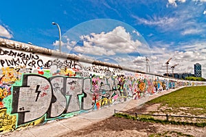 Memorable segment of Berlin Wall with graffiti