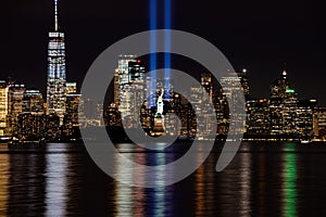 9/11 Memorial Beams with Statue of Liberty and Lower Manhattan