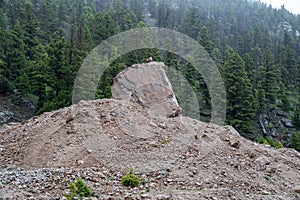 Memorial Boulder, at the Earthquake Lake Quake Lake Geological Area in Montana, west of Yellowstone National Park photo