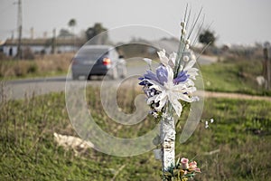 Memorial bouquet at the site of a road accident