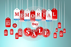 Memorial Day and Sale tag hanging in store for promotion