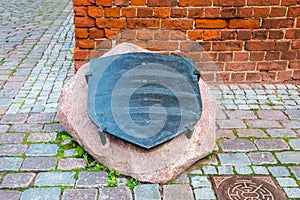 Memorial for memorise a young Baker`s Journeyman - a legendary defender of Elblag. In 1521, he used his shovel to cut a rope holdi