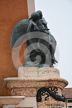 Memorial statue against the blue sky in Marostica, Italy