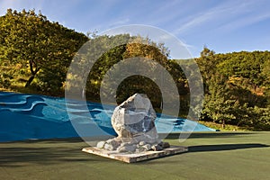 Memorial stone in a park in the city of Nakhodka.