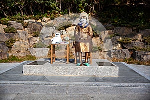 Statue of the little sad Korean girl that was caught as a slave by the Japanese army in the colonization period.