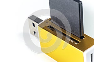 Memory gold card reader on white background