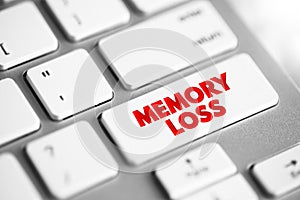 Memory Loss - amnesia is a deficit in memory caused by brain damage or disease, text concept button on keyboard