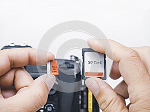 Memory micro SD and SD cards are compared for usage with digital DSLR cameras