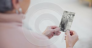 Memory, senior and woman with a photograph with hands in closeup for nostalgia in home. History, retirement and elderly