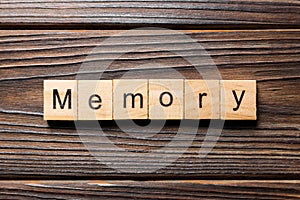 Memory word written on wood block. memory text on table, concept
