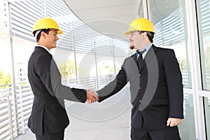 Men Architects Shaking Hands