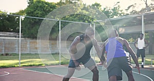 Men, basketball court and outdoor for game, dribble and speed with fitness, training or competition. Black people