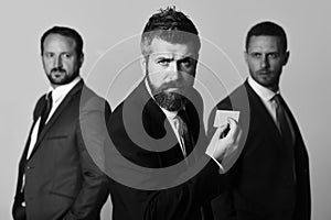 Men with beard and determined faces advertise company and partnership