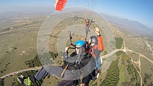 Men being afraid while paragliding