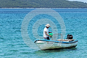 Men in boat fishing, Adriatic sea, Croatia