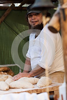 Men braking bread