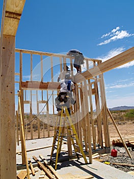 Men Building Frame for House - Vertical