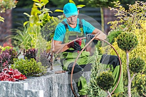 Men Building Garden Irrigation
