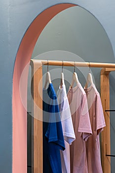 Men casual T shirt colorful hang in clothes rack