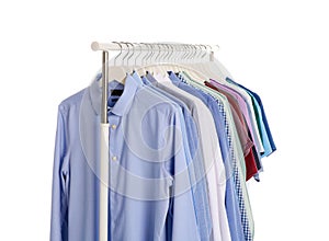 Men clothes hanging on wardrobe rack