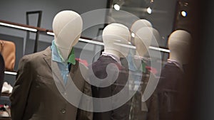 Men clothing in a luxury store(window display view