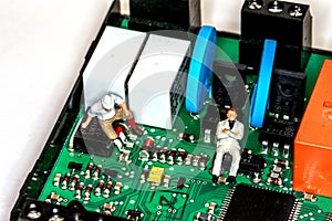 Men in a computer board