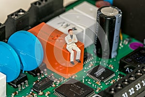 Men in a computer board