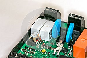 Men in a computer board