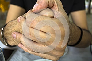 Men cracking their knuckles