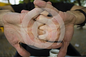 Men cracking their knuckles