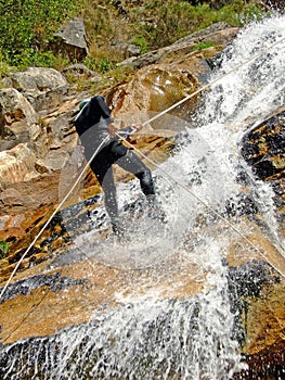 Men descending on rappel