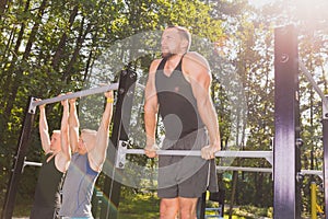 Men doing pull-ups