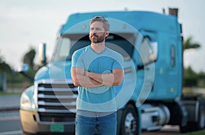 Men driver near lorry truck. Man owner truck driver near truck. Handsome middle aged man trucker trucking owner