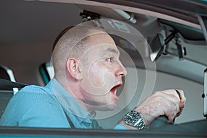 Men driving. emotion. Screaming, scared. Human emotion face expression