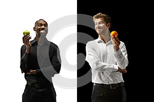 Men eating a fruits on a black and white background