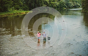Men fishing relaxing while enjoying hobby. Bearded men in hats fishing. Master baiter. Friends men with fishing rod and
