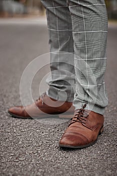 Men in formal grey pants