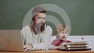 Men generation. Generations ages, father and child son typing on typewriter and laptop. Old and young people. Technology