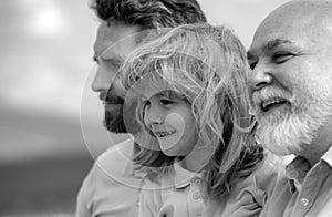 Men generation portrait of grandfather father and son child. Fathers day. Men in different ages. Happy muti three photo