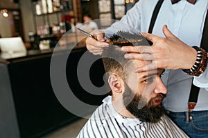 Men Haircut. Barber Cutting Man`s Hair In Barber Shop