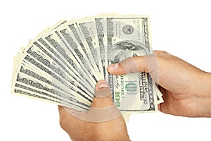 A Men hand holding hundred dollar bill on white background.