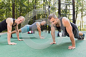 Men having calisthenics training