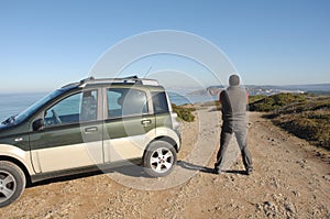 Men with his 4x4 car