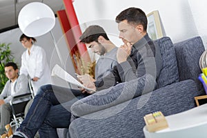 Men in hospital waiting room