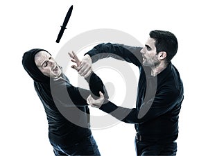 Men krav maga fighters fighting isolated