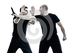 Men krav maga fighters fighting isolated